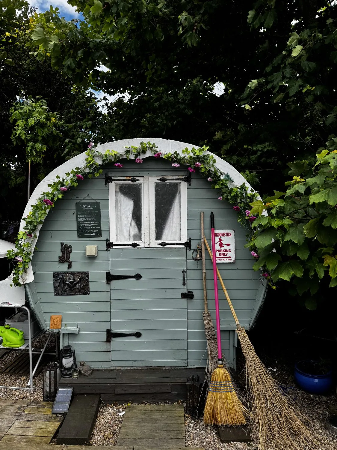The LilyPod's hand-decorated Romany wagon among the trees